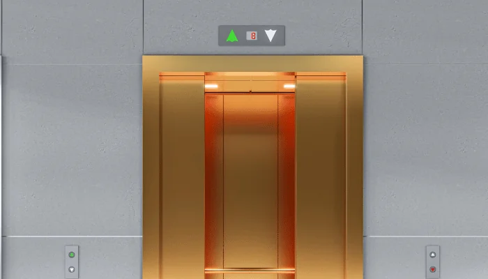 3 Elevator doors in a lobby