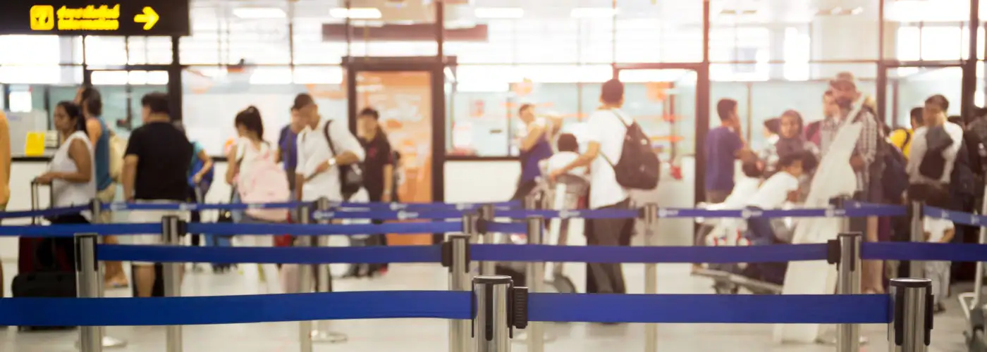 People waiting in airport security line