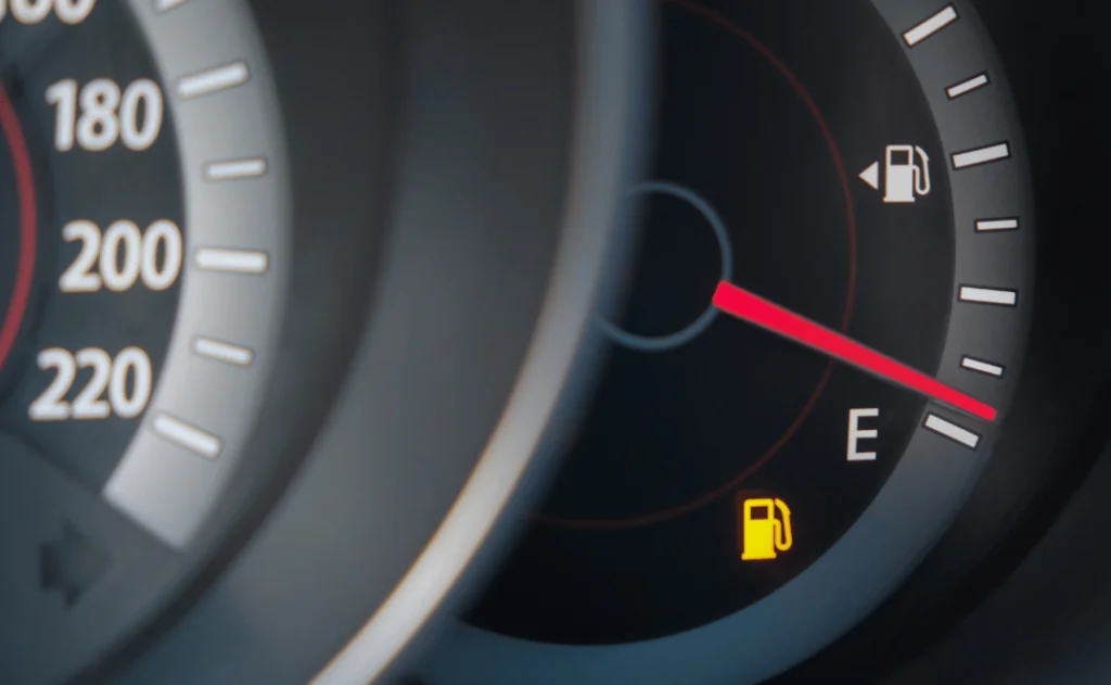 Fuel gauge with warning indicating low fuel tank