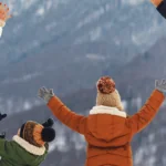 happy family mother father and children on winter nature
