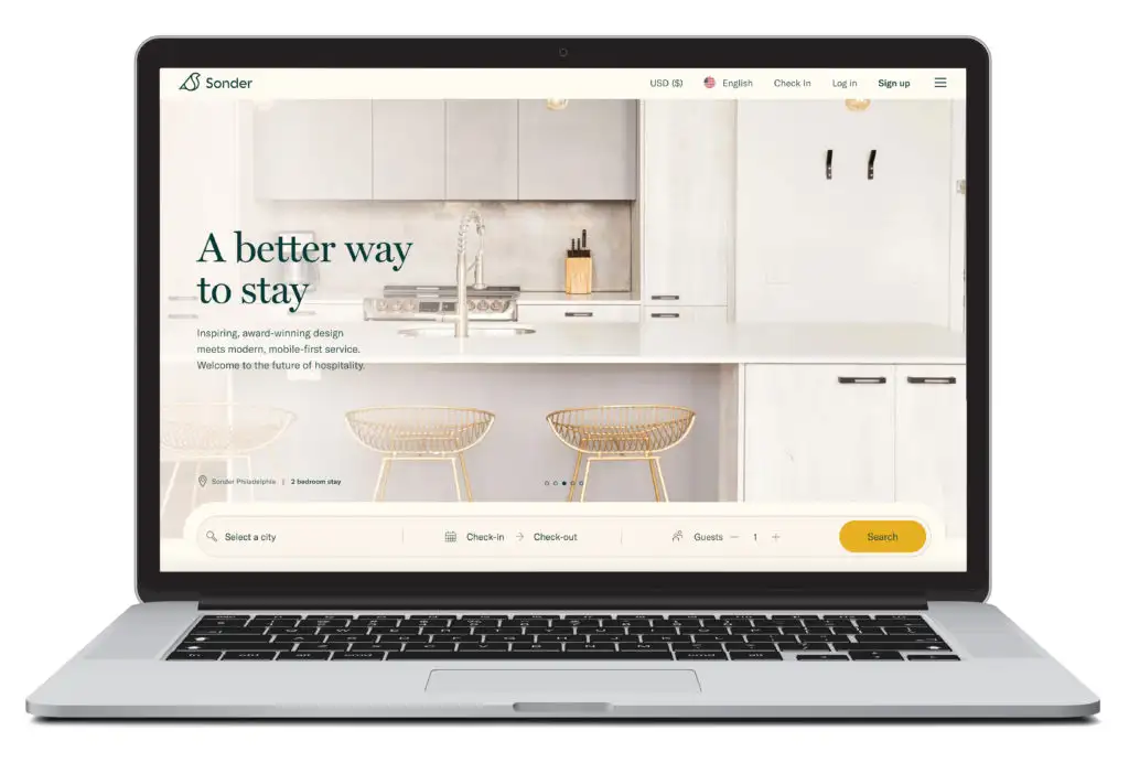 Digital rendering of a laptop showing the homepage of Sonder