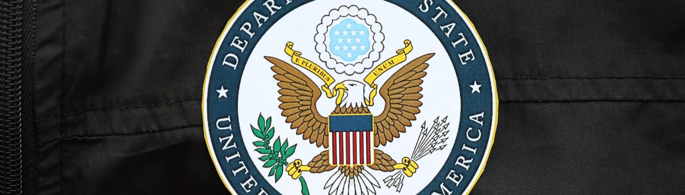 US State Department logo on black background